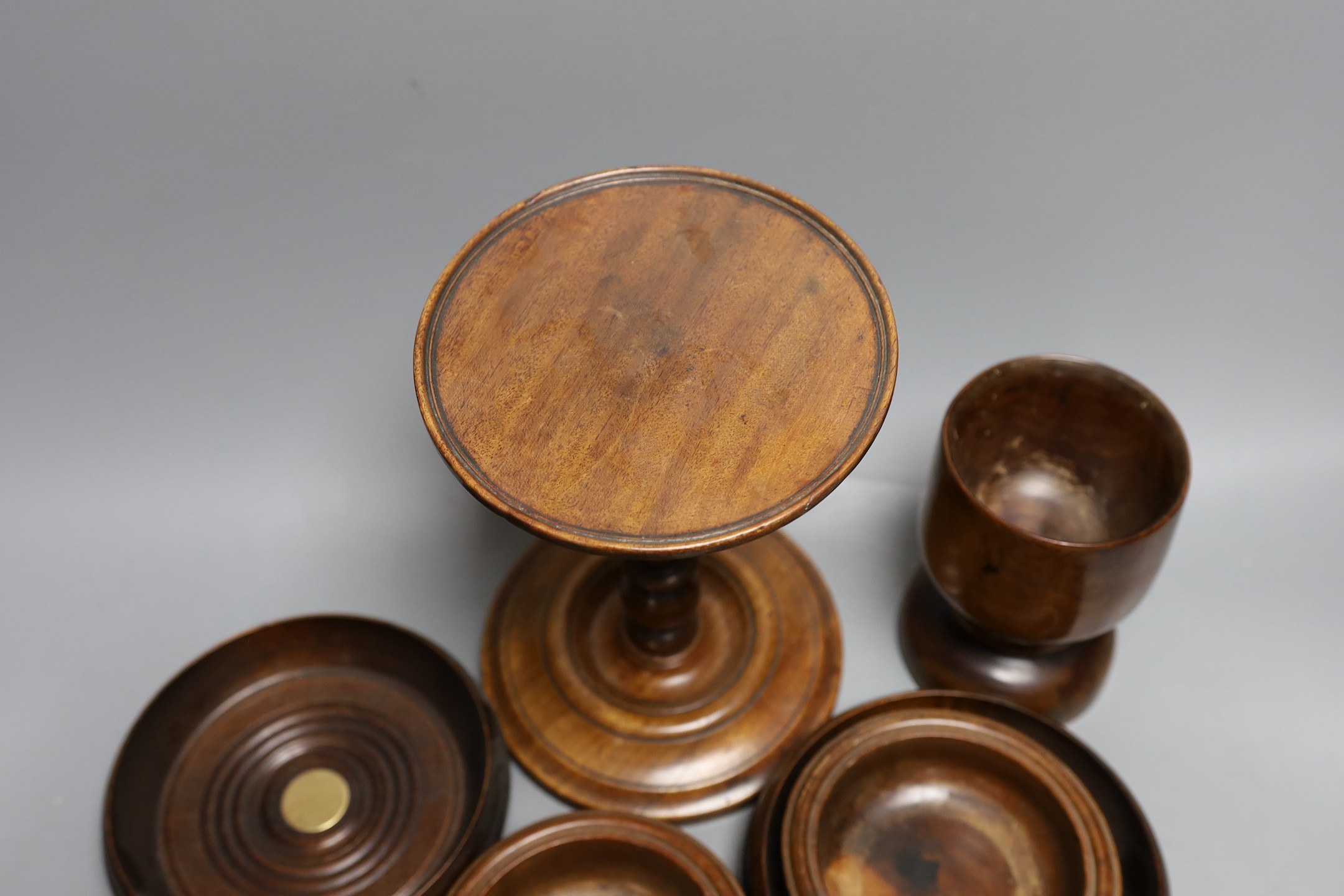 A mahogany adjustable candle stand, coasters etc.